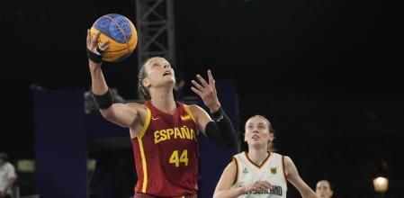 Spain's Gracia Alonso (44) shoots as Germany's Elisa Mevius (8) purses during a women's 3x3 basketball gold medal game at the 2024 Summer Olympics, Monday, Aug. 5, 2024, in Paris, France. (AP Photo/Frank Franklin II)