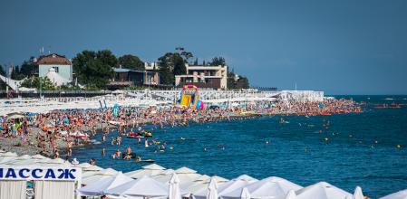 SOCHI, RUSSIA - JUNE 28: Tourists enjoy the weather on the beach of the Black Sea on June 28, 2017 in Sochi, Russia. (Photo by Lukas Schulze - FIFA/FIFA via Getty Images)