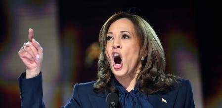 TOPSHOT - US Vice President and 2024 Democratic presidential candidate Kamala Harris speaks on the fourth and last day of the Democratic National Convention (DNC) at the United Center in Chicago, Illinois, on August 22, 2024. (Photo by ANDREW CABALLERO-REYNOLDS / AFP)