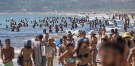 Crowded beach at Los Lances, Tarifa, Costa de la Luz, Cadiz, Andalusia, Southern Spain.