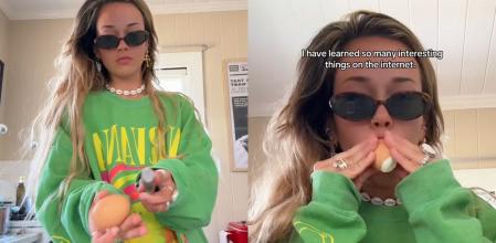 La joven hace dos orificios en los extremos del huevo y sopla para que este salga propulsado.