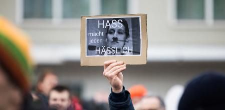 People protest against the leader of far-right Alternative for Germany (AfD) Alice Weidel, on the eve of the German elections, in her family home town, in Einsiedeln, Switzerland, February 22, 2025. REUTERS/Pierre Albouy