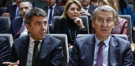 El presidente del Partido Popular, Alberto Núñez Feijóo, y el president de la Comunidad Valenciana, Carlos Mazón, durante un encuentro empresarial, en la sede de la CEV. 
