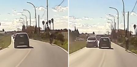 El peligroso adelantamiento de un conductor a un ciclista que está muy cerca de costarle un choque frontal