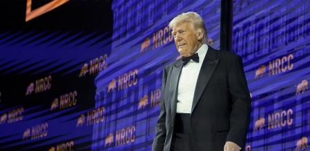 President Donald Trump arrives to speak at the National Republican Congressional Committee (NRCC) dinner at the National Building Museum in Washington, Tuesday, April 8, 2025. (Pool via AP)