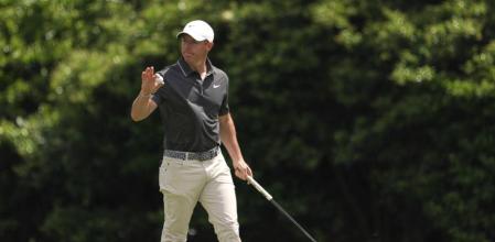 Rory McIlroy, of Northern Ireland, waves after making a putt on the 12th hole during the second round at the Masters golf tournament, Friday, April 11, 2025, in Augusta, Ga. (AP Photo/Matt Slocum)