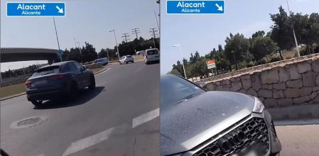 El momento en el que un coche sale de una rotonda desde el carril interior y se cruza con un motorista