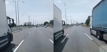 El momento en el que un camión adelanta a un coche por el tercer a la izquierda de una autovía y el turismo queda entre dos camiones