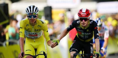 Cycling - Tour de France - Stage 10 - Ennezat to Mont-Dore - Ennezat, France - July 14, 2025 UAE Team Emirates XRG's Tadej Pogacar reacts crossing the finish line in ninth place in Stage 10 with tenth placed Team Visma | Lease a Bike's Jonas Vingegaard REUTERS/Sarah Meyssonnier TPX IMAGES OF THE DAY