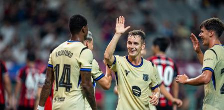 Marc Casadó junto a Rashford