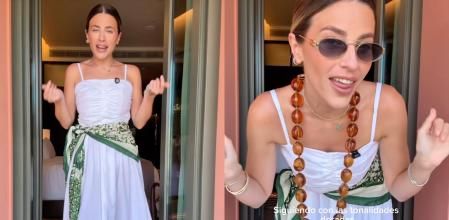 Natalia Cebrián eleva el vestido blanco con un pañuelo estampado