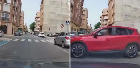 La temeraria maniobra de un todoterreno rojo en una calle de un pueblo de Castellón que casi provoca un accidente grave: “Esas ganas de acelerar en vez de frenar”