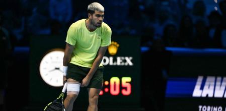 Spain's Carlos Alcaraz gestures during the men's single final match against Italy's Jannik Sinner at the ATP Finals tennis tournament, in Turin, on November 16, 2025. (Photo by Marco BERTORELLO / AFP)