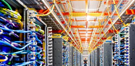 FILE PHOTO: A technician works at an Amazon Web Services AI data center in New Carlisle, Indiana, U.S., October 2, 2025. REUTERS/Noah Berger for AWS/File Photo