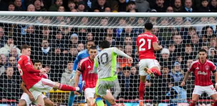 Manchester City's Rayan Cherki scores his side's second goal during the Premier League match between Nottingham Forest and Manchester City, in Nottingham, England, Saturday Dec. 27, 2025. (Joe Giddens/PA via AP)