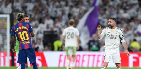 MADRID, SPAIN - OCTOBER 26: Dani Carvajal of Real Madrid gestures towards Lamine Yamal of FC Barcelona after the LaLiga EA Sports match between Real Madrid CF and FC Barcelona at Estadio Santiago Bernabeu on October 26, 2025 in Madrid, Spain. (Photo by David Ramos/Getty Images)