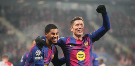 PRAGUE, CZECH REPUBLIC - JANUARY 21: Joan Garcia and Gerard Martin of FC Barcelona acknowledge the fans following the UEFA Champions League 2025/26 League Phase MD7 match between SK Slavia Praha and FC Barcelona at Eden Arena on January 21, 2026 in Prague, Czech Republic. (Photo by Gabriel Kuchta/Getty Images)