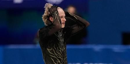 Ilia Malinin of the United States competes during the men's free skate program in figure skating at the 2026 Winter Olympics, in Milan, Italy, Friday, Feb. 13, 2026. (AP Photo/Ashley Landis)
