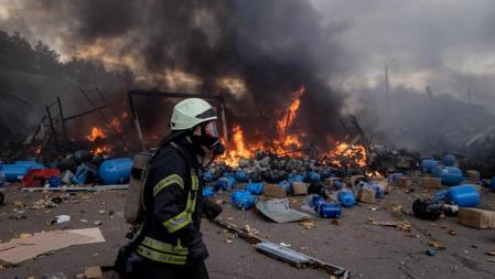 KYIV, UKRAINE - MARCH 08: Firefighters try to extinguish a fire after a chemical warehouse was hit by Russian shelling on the eastern frontline near Kalynivka village on March 08, 2022, in Kyiv, Ukraine. Russia continues assault on Ukraine's major cities, including the capital Kyiv, after launching a large-scale invasion of the country on February 24. (Photo by Chris McGrath/Getty Images)