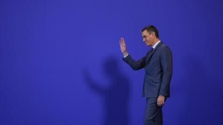Spain's acting Prime Minister Pedro Sanchez waves on arrival for the second day of the Europe Summit in Granada, Spain, Friday, Oct. 6, 2023. European Union leaders have pledged Ukrainian President Volodymyr Zelenskyy their unwavering support. On Friday, they will face one of their worst political headaches on a key commitment. How and when to welcome debt-laden and war-battered Ukraine into the bloc. (AP Photo/Manu Fernandez)