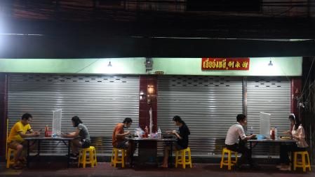 BANGKOK, THAILAND - 2020/05/08: Customers at Yaowarat Street food have dinner at a street restaurant implementing social distancing as a precaution during the Coronavirus (COVID-19) crisis.
Thailand's Health Ministry has so far recorded a total of 3,000 infections, 55 deaths and 2,784 recovered since the beginning of the outbreak. (Photo by Yuttachai Kongprasert/SOPA Images/LightRocket via Getty Images)