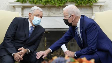 FILE - President Joe Biden meets with Mexican President Andrés Manuel López Obrador in the Oval Office of the White House in Washington, Nov. 18, 2021. The Summit of the Americas is a little more than two weeks away in Los Angeles, and there's still no clear answer on what countries are going. The confusion is a sign of chaotic preparations for the event, which the United States is hosting for the first time since the inaugural summit in 1994. Mexican President Andrés Manuel López Obrador has threatened to boycott if Cuba, Venezuela and Nicaragua aren't included. (AP Photo/Susan Walsh, File)