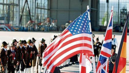 People prepare for arrivals of G7 leaders at Franz-Josef-Strauss airport in Munich to attend the G7 summit, which will take place in the Bavarian alpine resort of Elmau Castle, Germany, June 25, 2022. REUTERS/Michaela Rehle