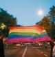 LGBT+ activists hold a rainbow flag as they protest over the death of Samuel Luiz, who was attacked outside a club in A Coruna, in Barcelona, Spain, July 5, 2021. Picture taken July 5, 2021. REUTERS/Nacho Doce