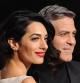 Amal Alamuddin y el actor George Clooney en la premiére de 