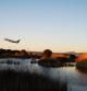 Avión sobrevolando el estanque de La Roberta.