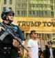 NEW YORK, NY - AUGUST 04: Police stand guard outside of Trump Tower on August 4, 2017 in New York City. Following a dispute with the Trump Organization over a lease, the Secret Service, which protects all US presidents, has moved to a small trailer on a side street outside of Trump Tower. The federal agency had been renting office space in Donald Trump's Midtown Manhattan skyscraper since 2015 before a disagreement over the terms and costs for rent for a command post. Spencer Platt/Getty Images/AFP == FOR NEWSPAPERS, INTERNET, TELCOS & TELEVISION USE ONLY ==