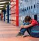 Niño sufriendo bullying en la escuela