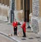 The Queen's corgis, Muick and Sandy are walked inside Windsor Castle on September 19, 2022, ahead of the Committal Service for Britain's Queen Elizabeth II. (Photo by Glyn KIRK / POOL / AFP)