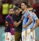 Spain's head coach Luis Enrique, left, embraces Sergio Busquets after the penalty shootout at the World Cup round of 16 soccer match between Morocco and Spain, at the Education City Stadium in Al Rayyan, Qatar, Tuesday, Dec. 6, 2022. (AP Photo/Luca Bruno)