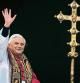 FILE - Pope Benedict XVI greets the crowd from the central balcony of St. Peter's Basilica at the Vatican, on April 19, 2005, soon after his election. When Cardinal Joseph Ratzinger became Pope Benedict XVI and was thrust into the footsteps of his beloved and charismatic predecessor, he said he felt a guillotine had come down on him. The Vatican announced Saturday Dec. 31, 2022 that Benedict, the former Joseph Ratzinger, had died at age 95. (AP Photo/Domenico Stinellis, File)
