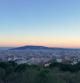 Atardecer de mar y montaña desde el Park Güell.