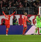 Soccer Football - Champions League - Round of 16 - Second Leg - Bayern Munich v Paris St Germain - Allianz Arena, Munich, Germany - March 8, 2023 Bayern Munich's Eric Maxim Choupo-Moting celebrates scoring their first goal as Paris St Germain's Gianluigi Donnarumma reacts REUTERS/Angelika Warmuth
