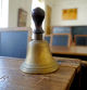 Old historical classroom with wooden desks and chalkboards