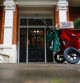 A Royal Mail Plc postman leaves a trolley on a street as he makes a delivery to a residential address in London, U.K., on Thursday, Oct. 08, 2020. Covid-19 lockdown enabled online and app-based grocery delivery service providers to make inroads with customers they had previously struggled to recruit, according the Consumer Radar report by BloombergNEF. Photographer: Hollie Adams/Bloomberg