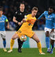 NAPLES, ITALY - FEBRUARY 21: Frenkie de Jong of FC Barcelona controls the ball whilst under pressure from Andre-Frank Zambo Anguissa of SSC Napoli during the UEFA Champions League 2023/24 round of 16 first leg match between SSC Napoli and FC Barcelona at Stadio Diego Armando Maradona on February 21, 2024 in Naples, Italy. (Photo by Francesco Pecoraro/Getty Images)