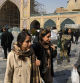 Two women without wearing their mandatory Islamic headscarves walk through the Imam mosque in old main bazaar of Tehran, Iran, Saturday, March 2, 2024. A day after parliamentary election concluded in Iran, hard-liners are leading in initial vote counting in the capital of Tehran, state media reported Saturday. (AP Photo/Vahid Salemi)