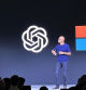 File - OpenAI CEO Sam Altman, left, appears onstage with Microsoft CEO Satya Nadella at OpenAI's first developer conference, on Nov. 6, 2023, in San Francisco. Negotiators will meet this week to hammer out details of European Union artificial intelligence rules but the process has been bogged down by a simmering last-minute battle over how to govern systems that underpin general purpose AI services like OpenAI's ChatGPT and Google's Bard chatbot. (AP Photo/Barbara Ortutay, File)