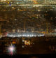 Estadio de fútbol del Barcelona en la noche de Sant Joan visto desde Vallvidrera.