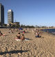 Bañistas toman el sol en la playa del Somorrostro, en Barcelona, el viernes 7 de agosto del 2020