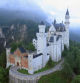 HOHENSCHWANGAU, GERMANY - JUNE 11: Schloss Neuschwanstein castle stands in this aerial view in the early morning on June 11, 2015 near Hohenschwangau, Germany. Schloss Neuschwanstein, built by Bavarian King Ludwig II, also known as Mad King Ludwig, is among Bavaria's biggest tourist attractions and major landmarks. (Photo by Sean Gallup/Getty Images)