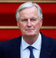Michel Barnier, en el patio del palacio de Matignon, durante el traspaso de poder