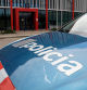 Coche de los Mossos d'Esquadra en la puerta de la comisaría de Lleida.