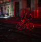 A resident walks his bicycle during a blackout following the failure of a major power plant in Havana, Cuba, Sunday, Oct. 20, 2024. (AP Photo/Ramon Espinosa)