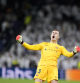 Barcelona's goalkeeper Inaki Pena celebrates at the end of a Spanish La Liga soccer match between Real Madrid and Barcelona at the Santiago Bernabeu stadium in Madrid, Spain, Saturday, Oct. 26, 2024. (AP Photo/Bernat Armangue)