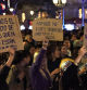Mujeres muestran carteles reivindicativos en la manifestación del 25-N, Día Internacional de la Eliminación de la Violencia contra la Mujer, en Barcelona